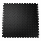 Black interlocking pvc garage floor tile mat on a white background